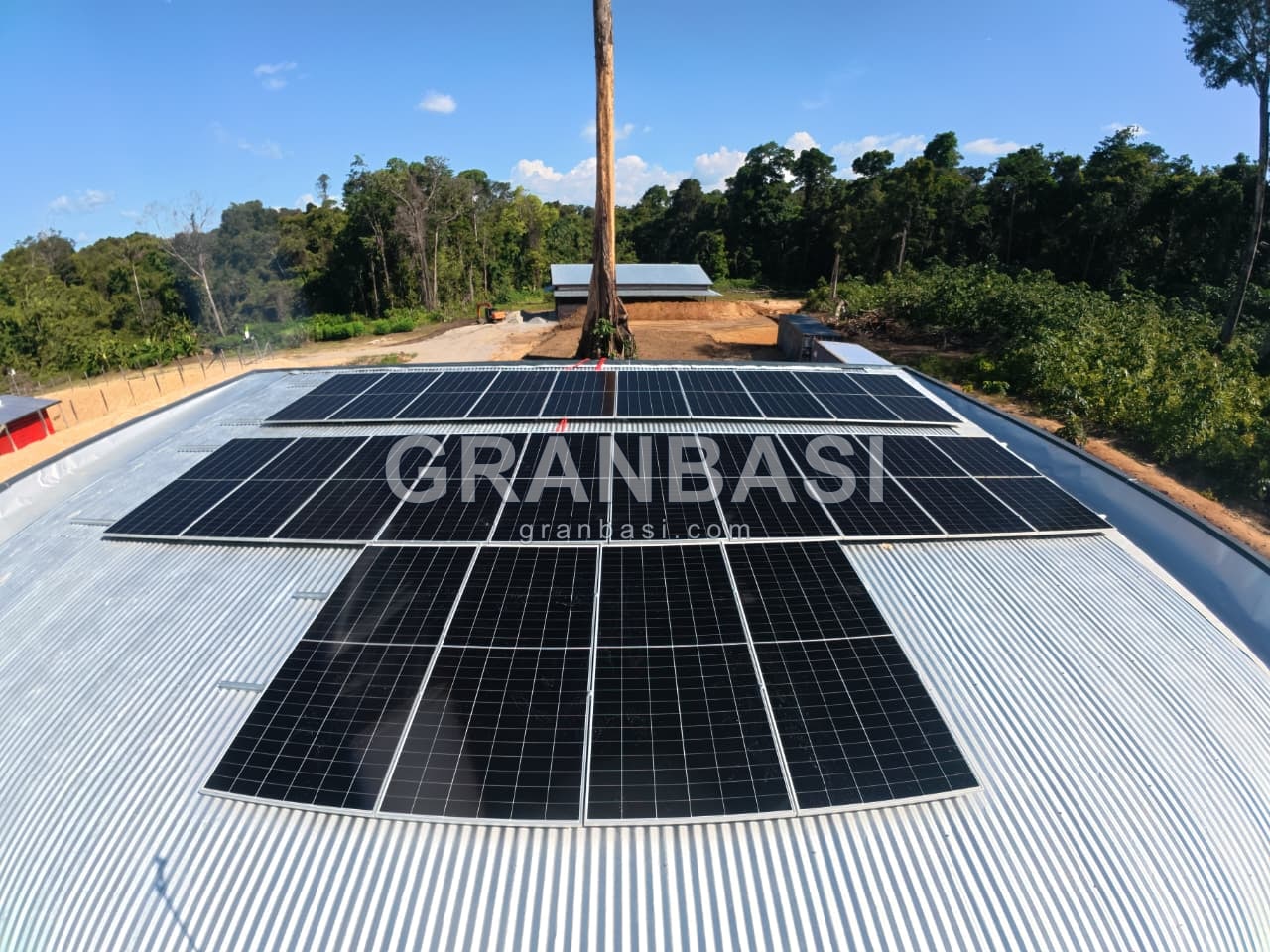 Three rows of panels, commercial roof