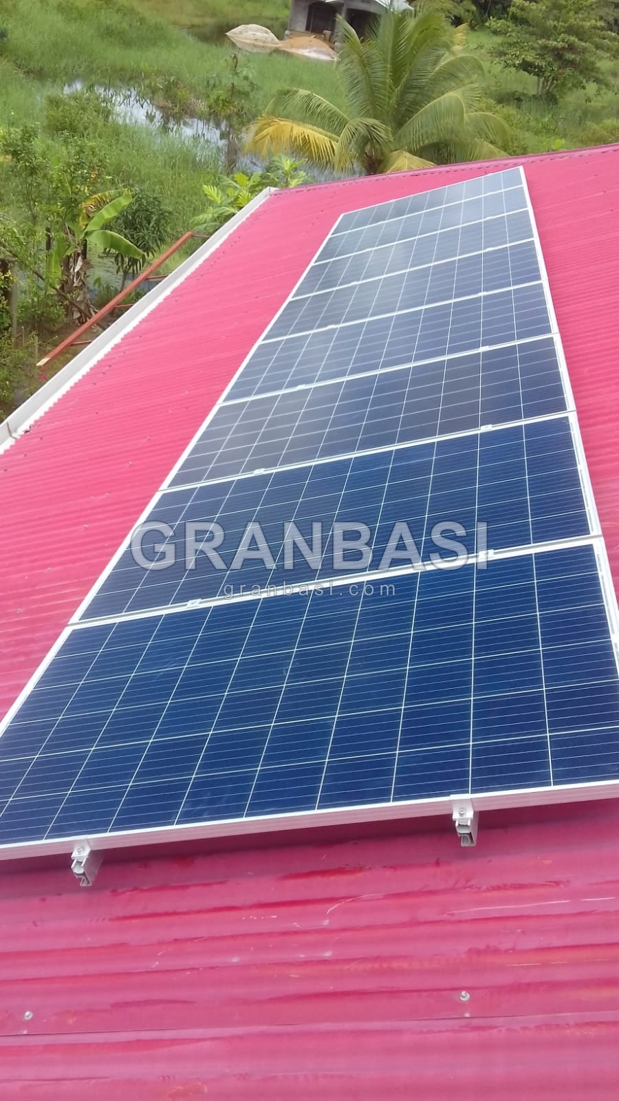 Panels on a red roof